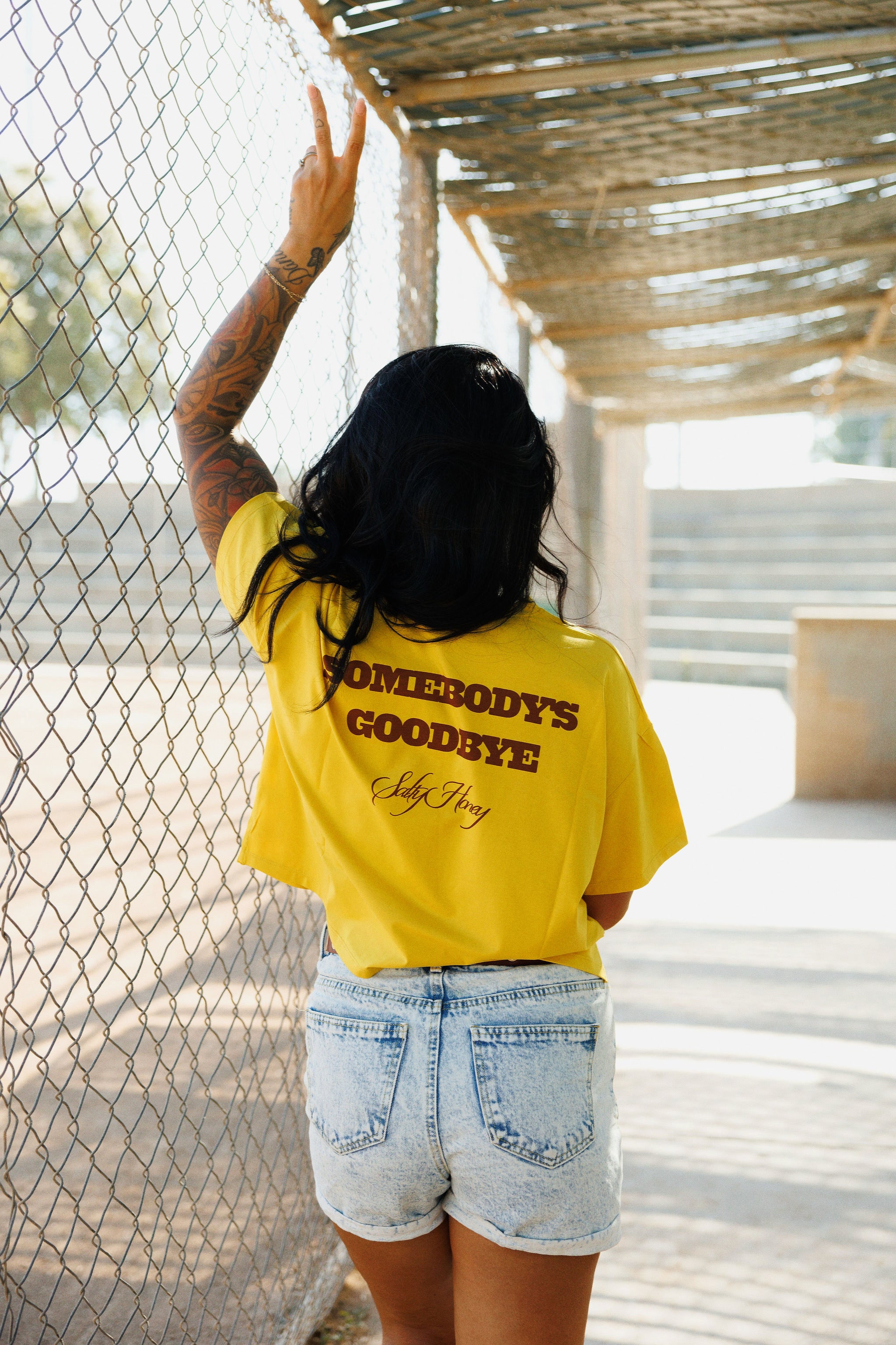 BALANCE TEE: SOMEBODYS PROBLEM (MUSTARD)
